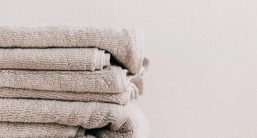 Clean towels folded in a neat stack